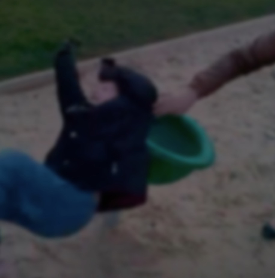 Child spinning off of playground ride