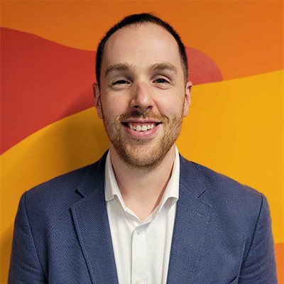 Headshot of Greg Jensen